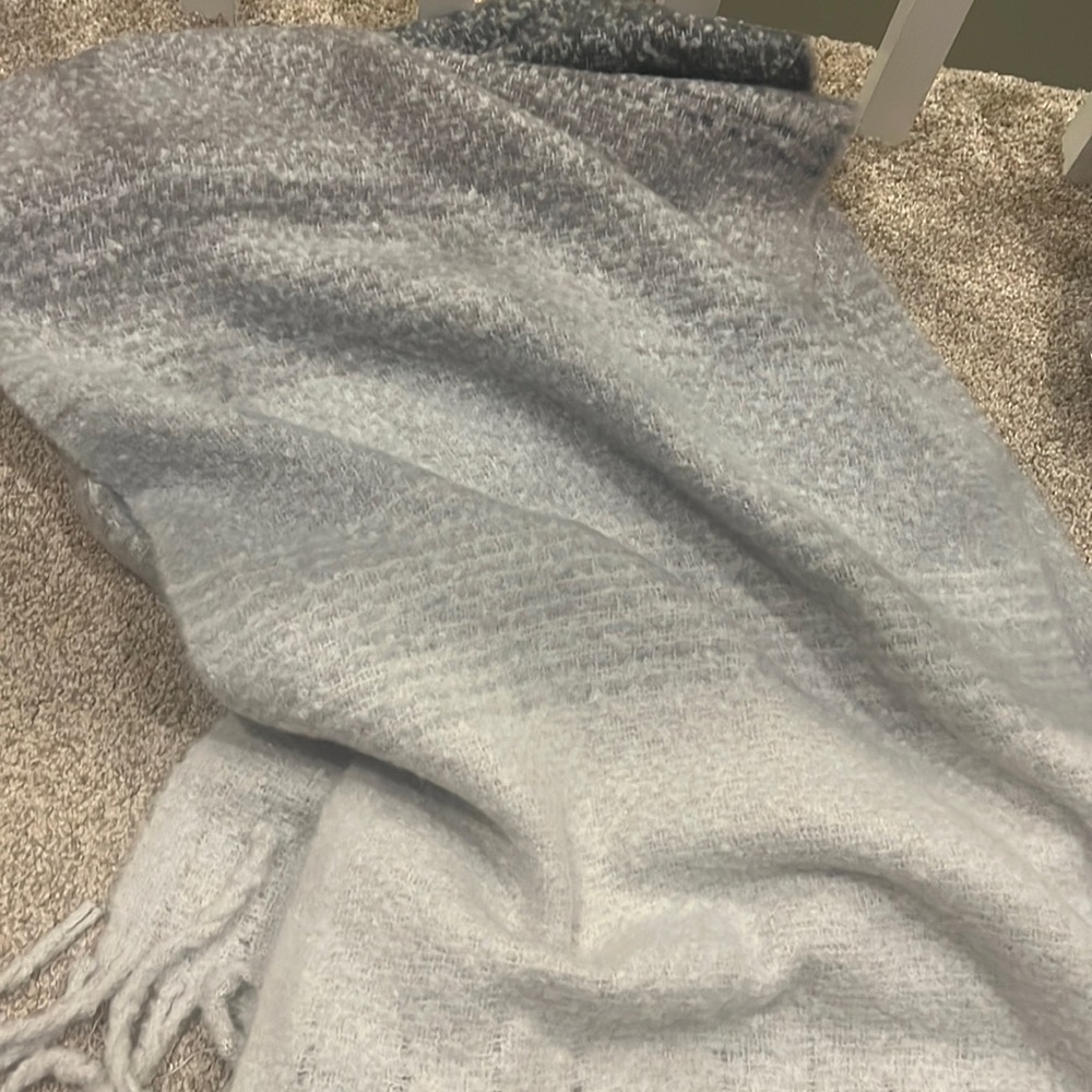 Never worn thick gray knit scarf with tassel detail